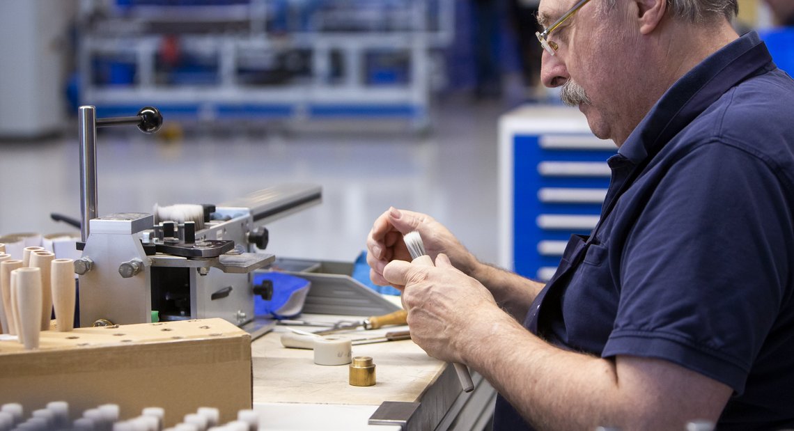 Brush maker on machine