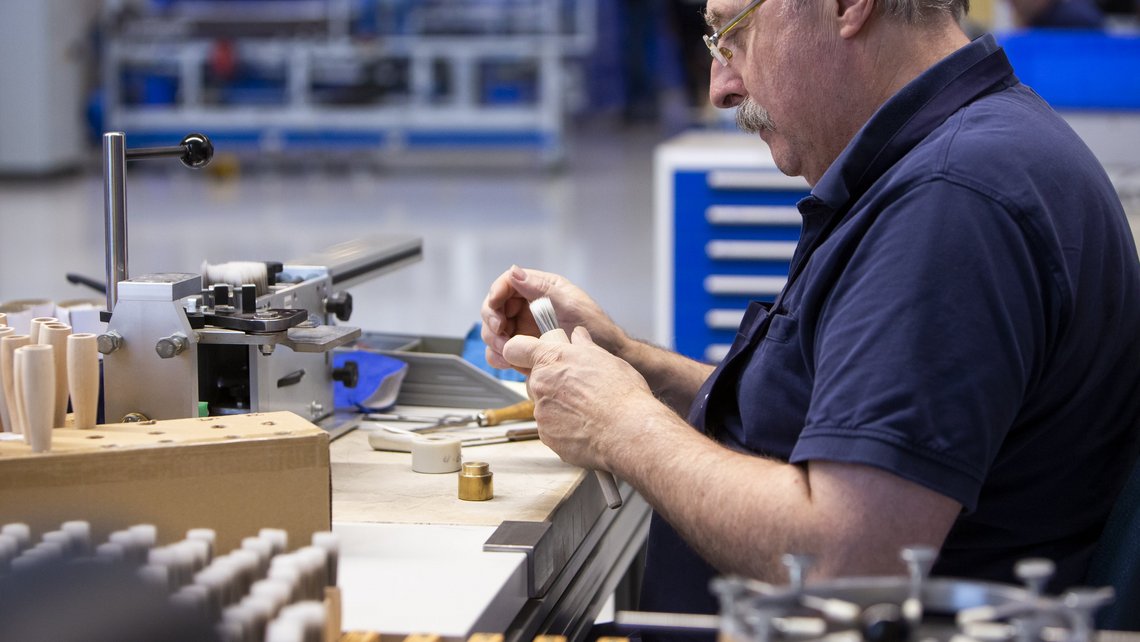 Brush maker on machine